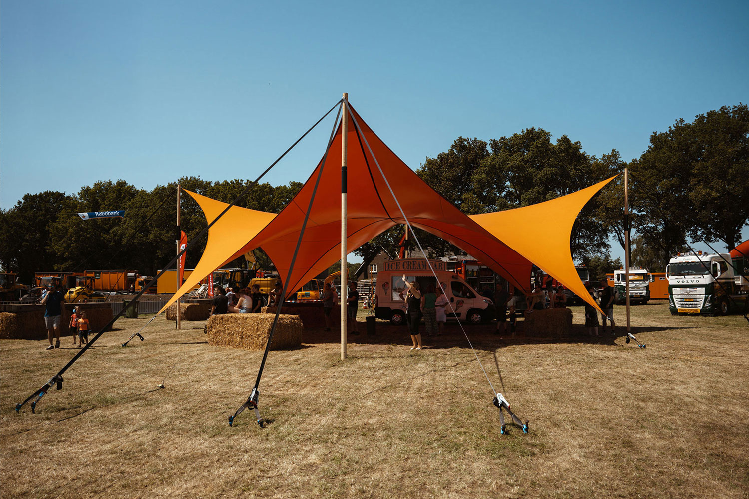 Festival shelter tent in orange with foodtruck event