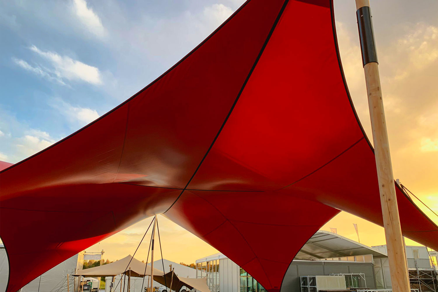 Qtents Red Festival Shelter with sunset view