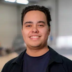 Qtents employee with a big smile