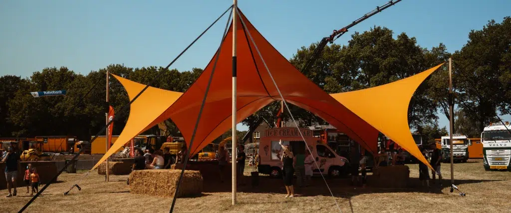 Orange Qtents Festival Tent Outdoor event with an icecream truck