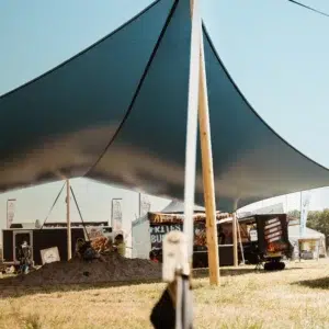Qtents black festival tent outdoor area